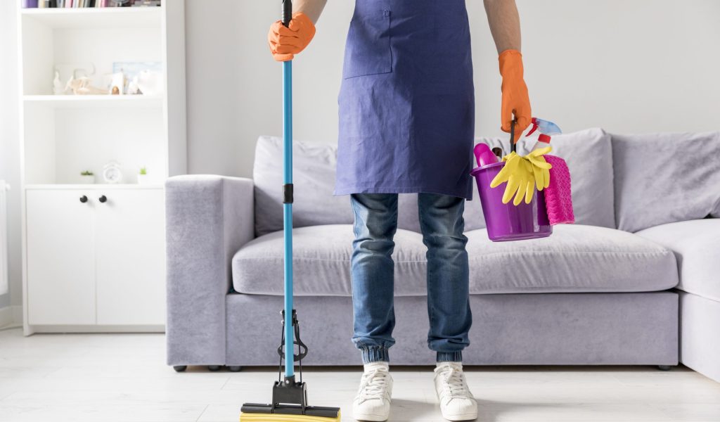 man-cleaning-his-home